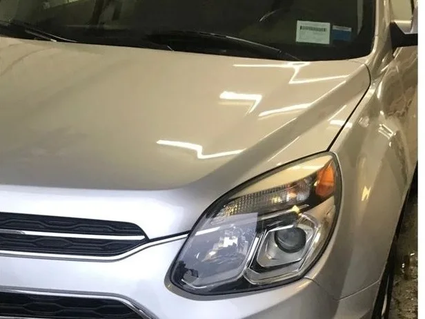 The same Equinox with the fender and headlight repaired