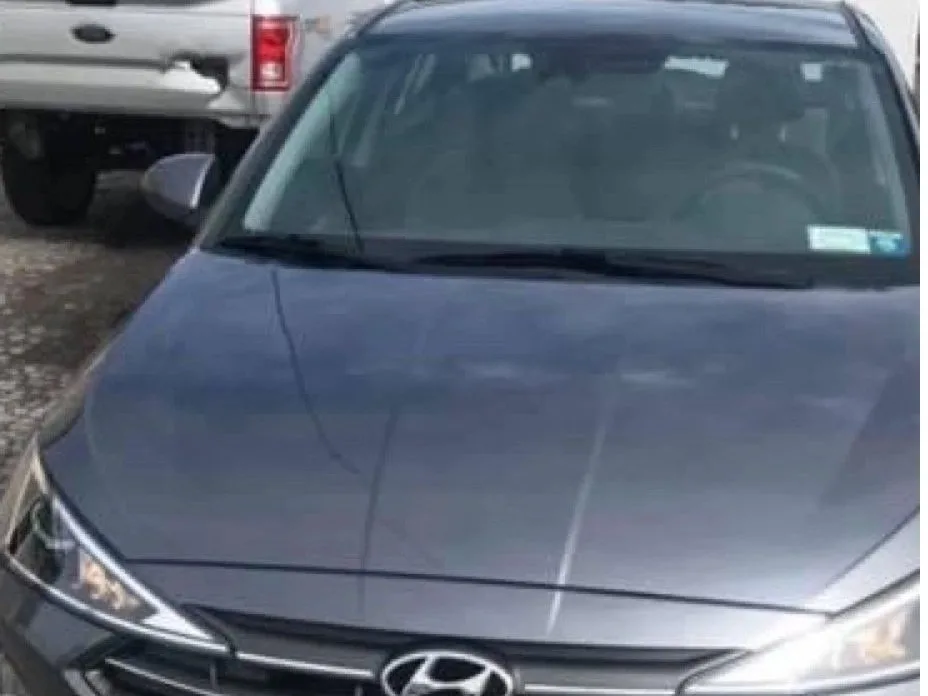 The same Hyundai with a new hood and front end